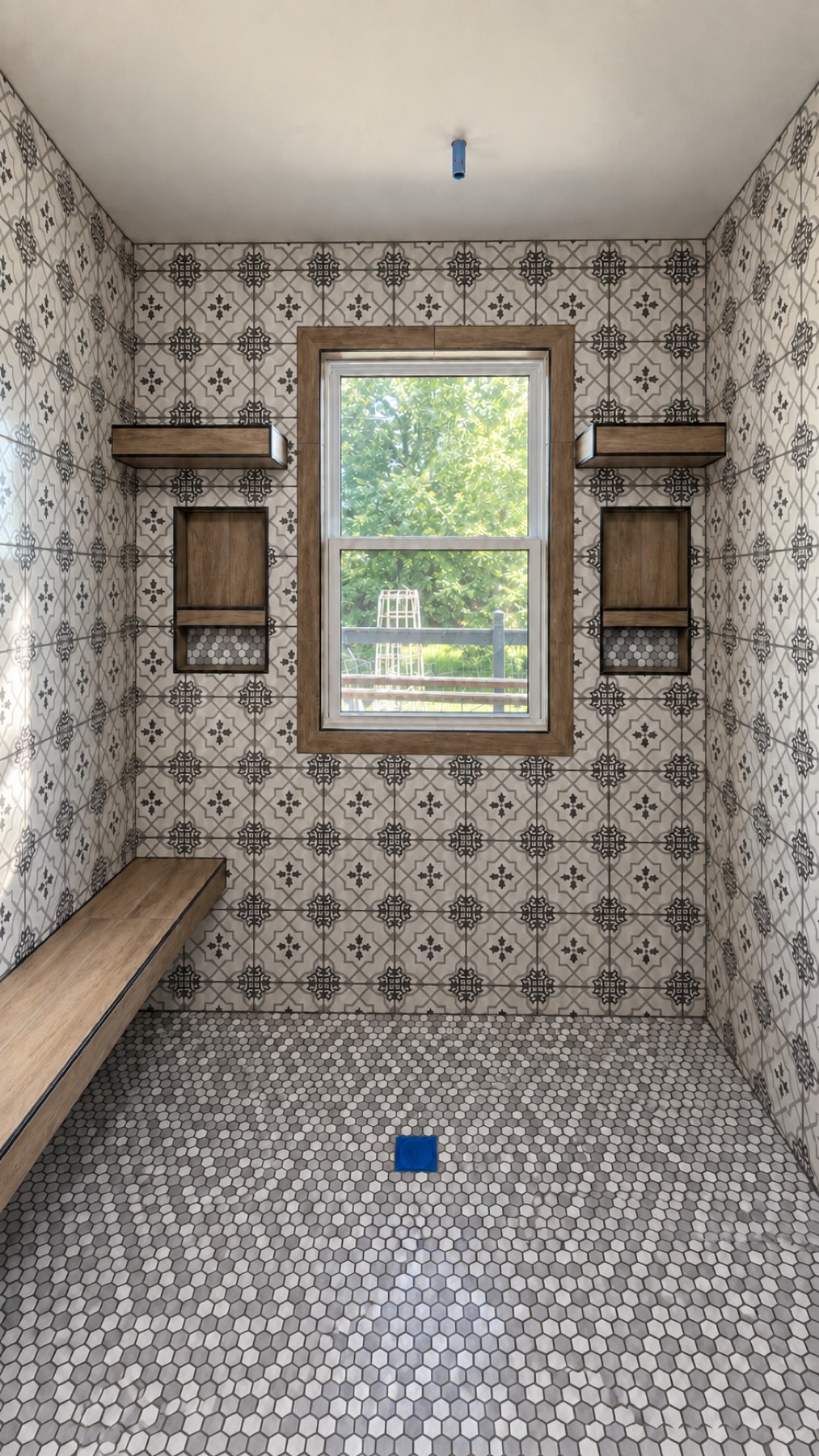 Patterned cement look tile with wood trimmed niches and bench